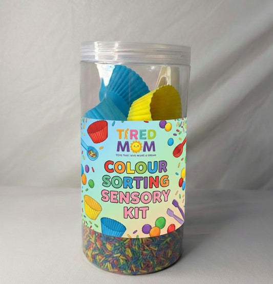 Color sorting sensory kit in a clear container with colorful label on a gray background